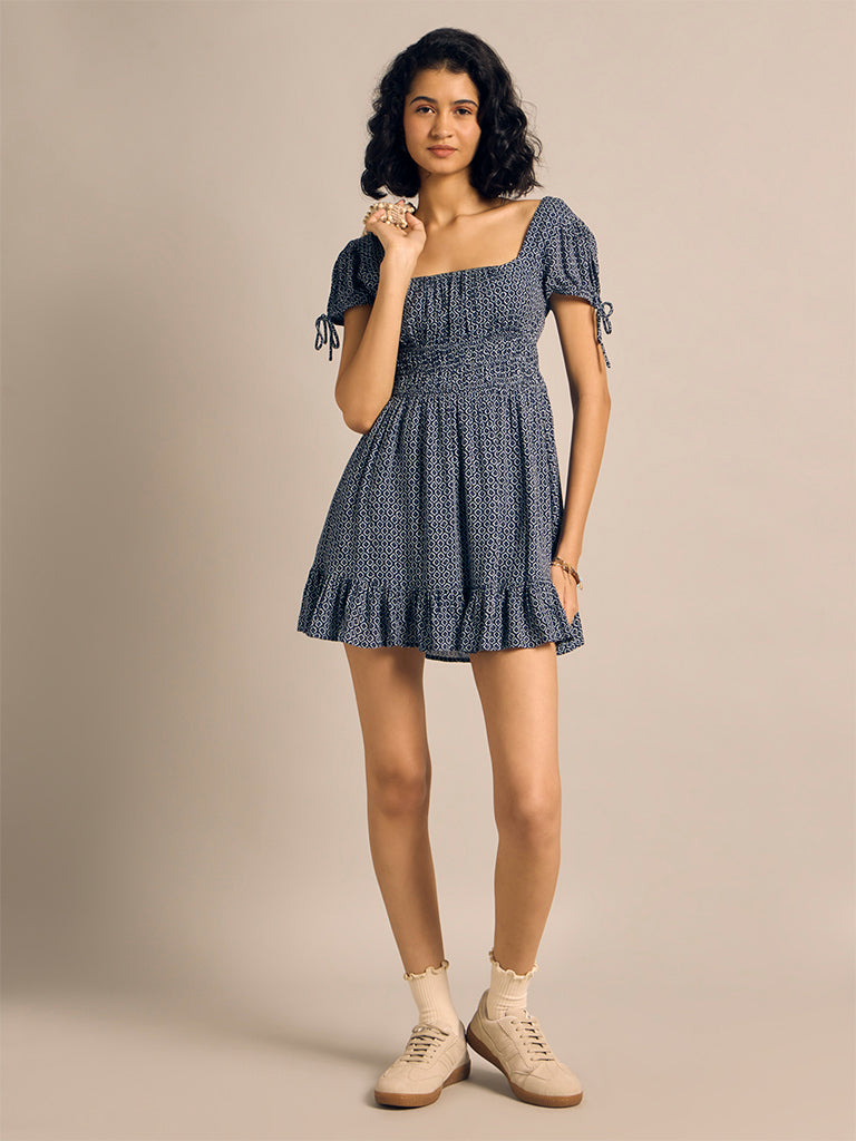 Smoked Ruffle-Hem Mini Dress