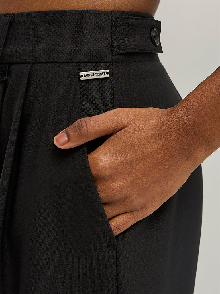 Wide-Leg Pleated Trousers